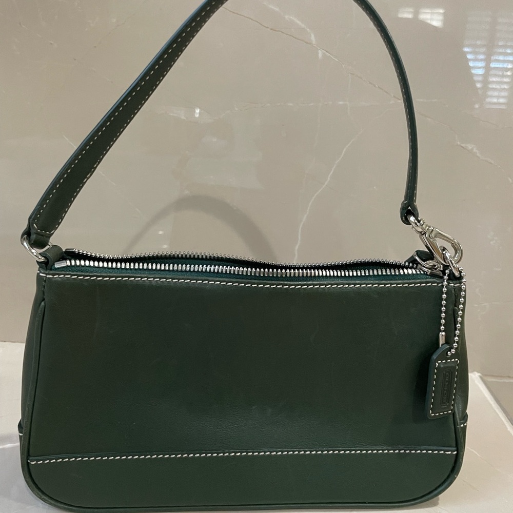Nearly new Green coach bag in great condition from a none smoker, with no pets.